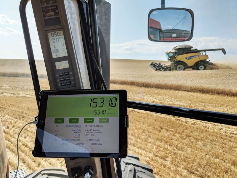 Tablet display for libra cart mounted in a combine showing data for the field in which the combine is running.